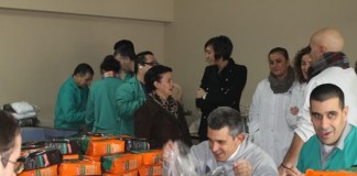 Responsables de Cafés Candelas visitan el taller ocupacional de Aspnais de Lugo